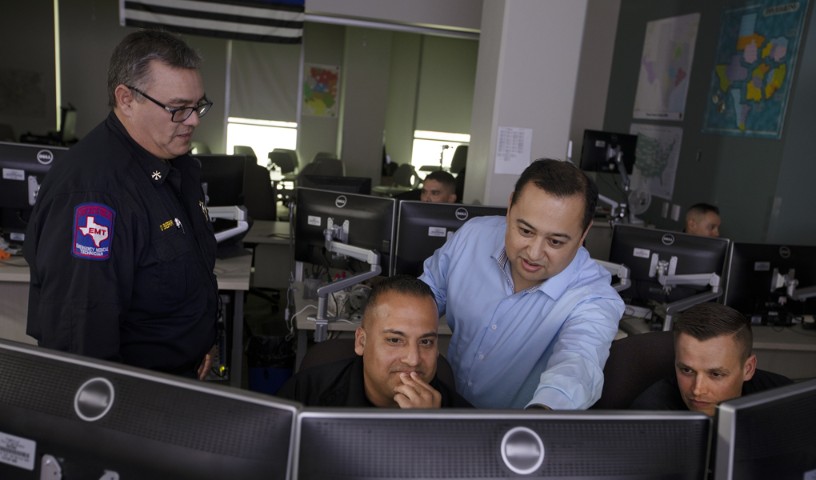 FirstNet responders gather around computer screens in office near the Alamo in San Antonio, Texas