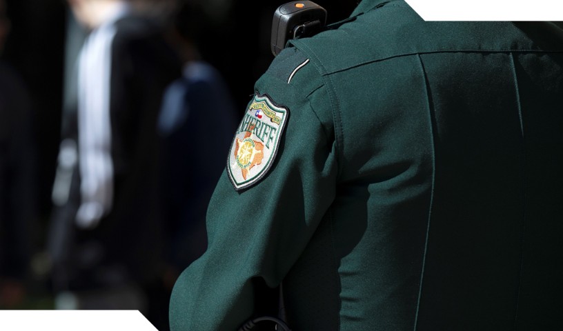 Back shoulder of Texas Sheriff with badge (close up)